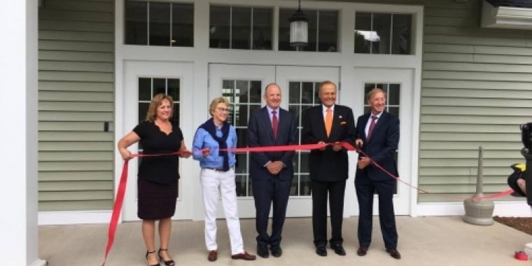 Senator Bonacic is pictured with Assemblywoman Aileen Gunther (blue) and other officials at the ribbon cutting ceremony in Livingston Manor.