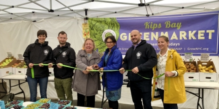 Senator Krueger cutting the ribbon at the Kips Bay Greenmarket