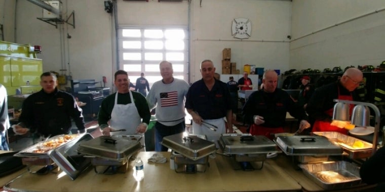 Senator Bonacic (center) is pictured with members of the Monticello Fire Department.