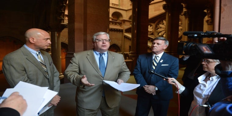 At a news conference in the Capitol last June, from left to right, New York State Association of Counties Executive Director Stephen J. Acquario, Senator O'Mara and Senator Rich Funke call on Assembly leaders to approve Senator O'Mara's paint stewardship legislation.