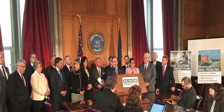 At a Capitol news conference, Senator O'Mara and other members of the Senate Republican conference unveiled a “Real Solutions” plan calling for a cap state government spending, making New York's property tax cap permanent, comprehensive mandate relief and regulatory reform, and broad-based tax relief. At a Capitol news conference, Senator O'Mara and other members of the Senate Republican conference unveiled a “Real Solutions” plan calling for a cap state government spending, making New York's property tax cap permanent, comprehensive mandate relief and regulatory reform, and broad-based tax relief.