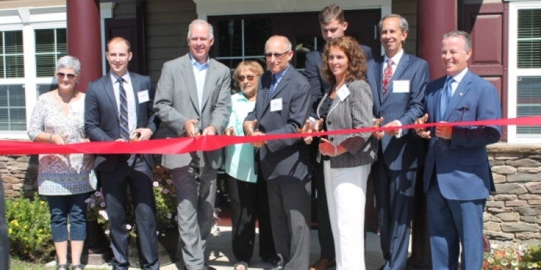Senator Ranzenhofer helps cut the ribbon to officially open a brand new, energy efficient apartment community.