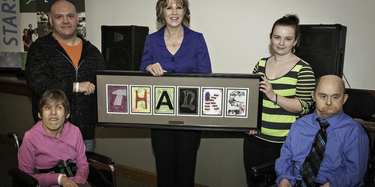 Rebecca Taylor, Michael Smallman, Kelsey Kilmartin and Laverne Ludwig presented Senator Young with the “Champion of TRC” award for her service to the developmentally disabled community.