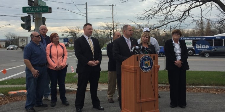 Senator Kennedy, Legislator Burke, Supervisor Holtz, elected officials, and the family of Chelsea Chandler announce major changes to Harlem-Walden intersection.