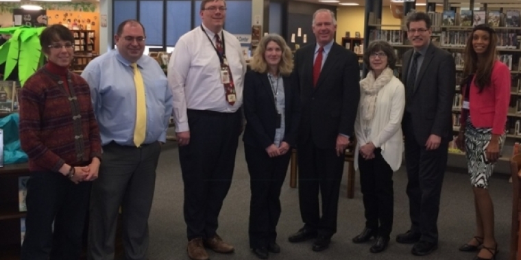 Senator Ranzenhofer poses for a picture with library representatives.