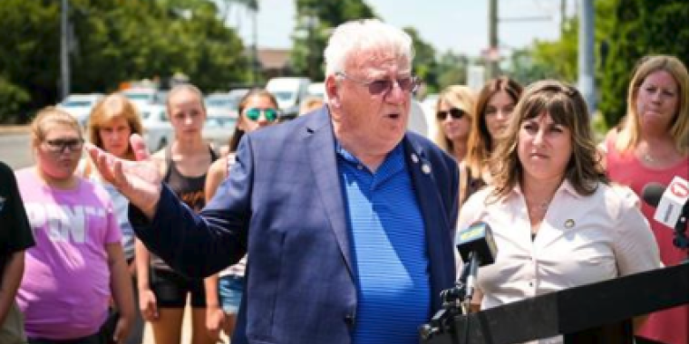State Sen. John Brooks, left, with Assemb. Christine Pellegrino, right, held a news conference on Monday, July 3, 2017. (Credit: Steve Pfost)