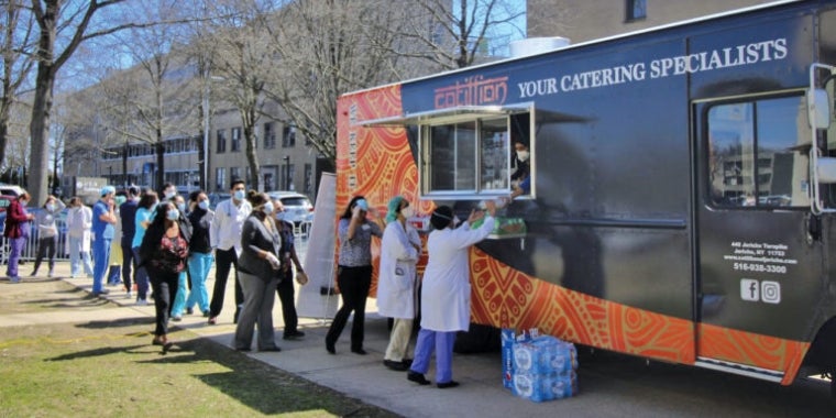State Senator Kevin Thomas, in a partnership with The Cotillion in Jericho, provided lunch to more than 300 NUMC workers.