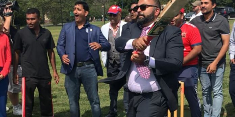 New York Senator Kevin Thomas, the only Indian-American elected to date to the state Senate, posing with a cricket bat testing out the newly-opened Cricket Pitch in Nassau County’s Eisenhower Park in September 2019. (Photo: courtesy Sen. Kevin Thomas)