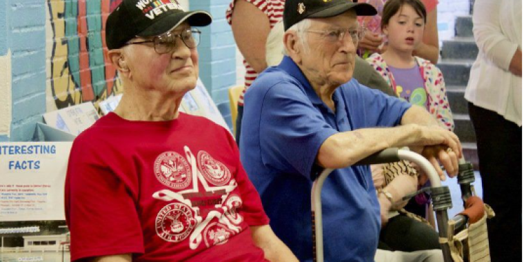 World War II veterans Stanley Maziarz, left, and John Lukasik, right, received honors during the 70th anniversary rededication of the Memorial Pool in North Tonawanda's Payne Park. The pool was built to recognize WWII soldiers who lost their lives in combat.