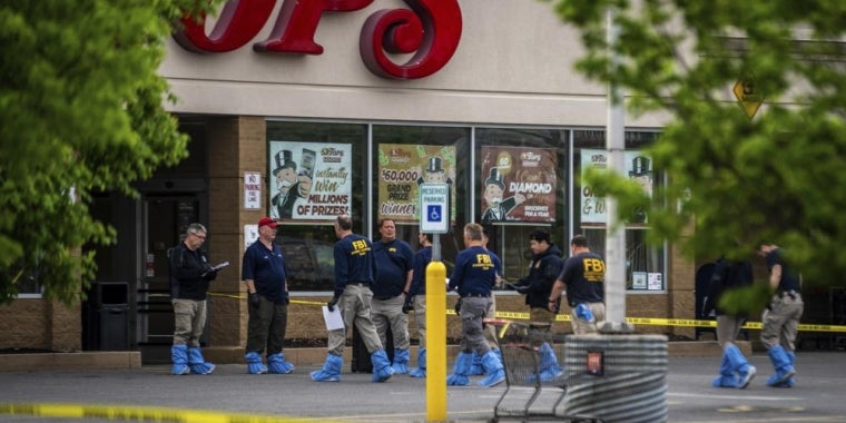 FBI Investigators enter the Tops supermarket in Buffalo, N.Y. on Monday, May 16 2022. (AP Photo/Robert Bumsted)