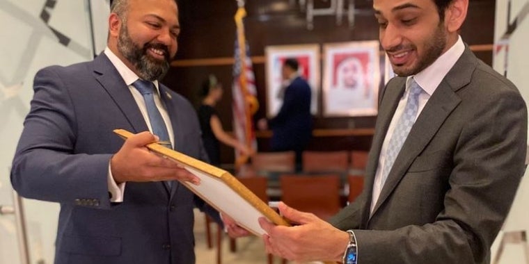 Abdalla Shaheen (right), Consul General of the UAE in New York, being presented with a copy of the Legislative Resolution by Senator Kevin Thomas, declaring December 2, 2021, as Emirati Day in New York state.