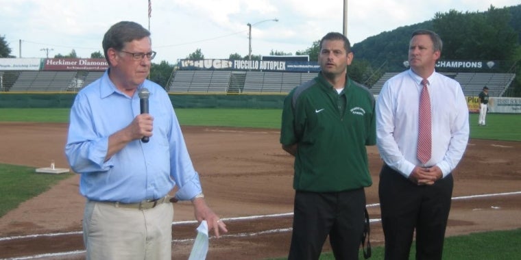 Senator James L. Seward announces a $100,000 grant to help fund upgrades at Veterans Memorial Park in Little Falls.  From left, Senator Seward, Mohawk Valley DiamondDawgs Owner/President/GM Travis Heiser, City of Little Falls Mayor Mark Blask.