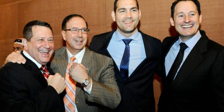 Assemblyman Joseph Morelle, Senator Joseph Griffo, former UFC middleweight champ Chris Weidman and UFC Chief Operating Officer Lawrence Epstein during a press conference earlier this year calling for New York State to legalize professional MMA.