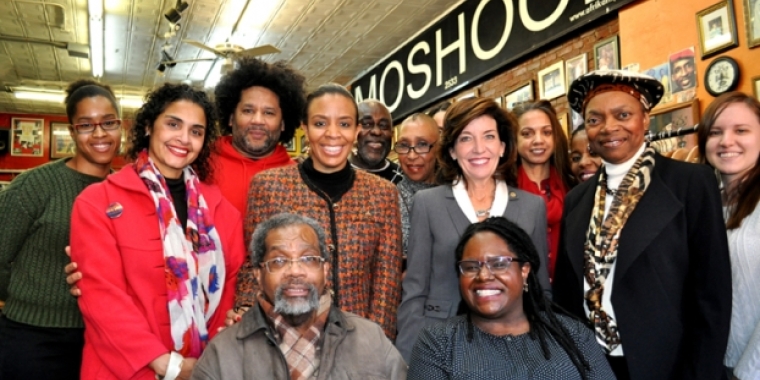 LG Kathy Hochul at Moshood in Ft. Greene. Participants included, starting from back row L: Deputy Boro President Diana Reyna (2nd from L); Jamel Gaines, Creative Outlet Dance Theater; NYC Councilwoman Laurie Cumbo; Moshood; Brenda Brunson Bey of Tribal Tents; NYS Lieutenant Governor Kathy Hochul; Dr. Indira Etwaroo, Executive Director, Bedford Stuyvesant-Restoration Center for Arts and Culture; Sabine LaFortune, Director of Operations, Bedford Stuyvesant-Restoration Center for Arts and Culture; NYS Senator 
