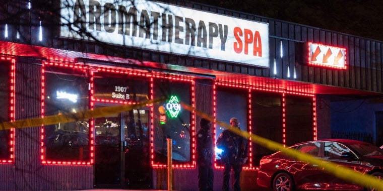 Law enforcement personnel outside a massage parlor where a person was shot and killed in Atlanta, Georgia, on Tuesday. Photo: Elijah Nouvelage/AFP via Getty Images