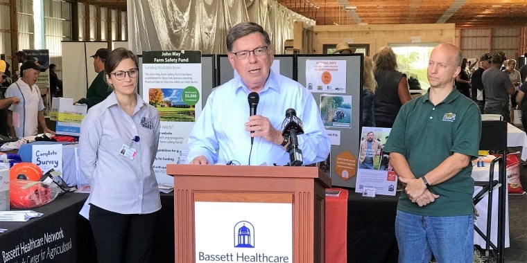Senator Seward (center) announces $250,000 in state funding to help support the New York Rollover Protection System (ROPS) Rebate Program. Standing behind Senator Seward from left to right are ROPS Rebate Program Hotline Coordinator Rebecca Russell and New York Farm Bureau Region 8 Field Advisor Todd Heyn.