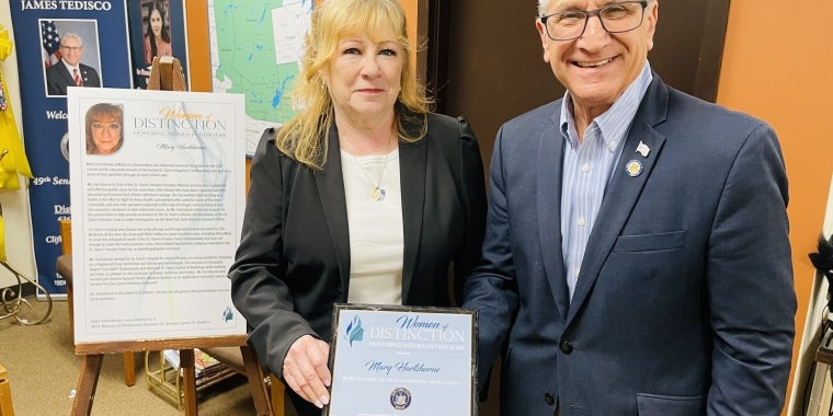 enator Tedisco presenting the “Women of Distinction” Award for the 49thSenate District to Mary Hartshorne at his district office in Clifton Park.