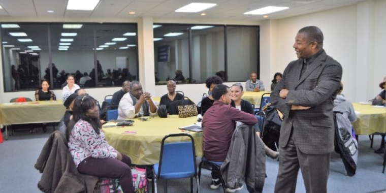 Senator Sanders greets the participants who have joined his financial boot camp program at a celebration on March 8, 2018 at the Jamaica Chamber of Commerce.