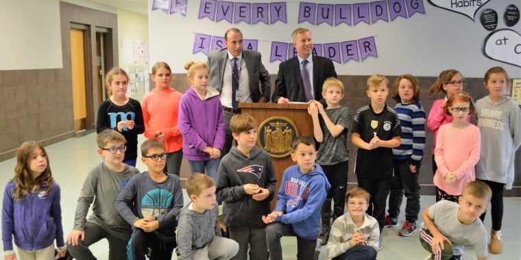 State Senator Chris Jacobs is pictured with Hamburg Central Schools Superintendent Michael Cornell and fourth grade students at Charlotte Avenue Elementary School announcing $75,000 the Senator secured to launch the district’s playground handicapped accessibility project.