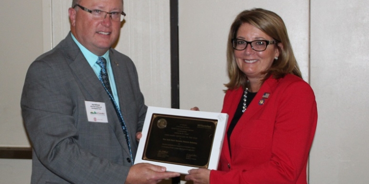 Jefferson County Agricultural Coordinator Jay Matteson presents Senator Pam Helming with the Farm Family Advocate of the Year Award from NY FarmNet during the organization’s annual banquet on Wednesday, Nov. 8 in Geneva.