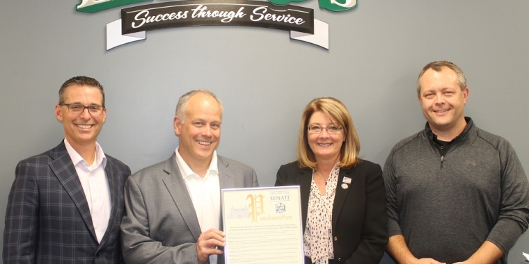 From left to right: Leonard’s Express Chief Marketing Officer Michael Riccio, Leonard’s Express CEO Ken Johnson, Senator Pam Helming, and Leonard’s Express CFO Kyle Johnson.