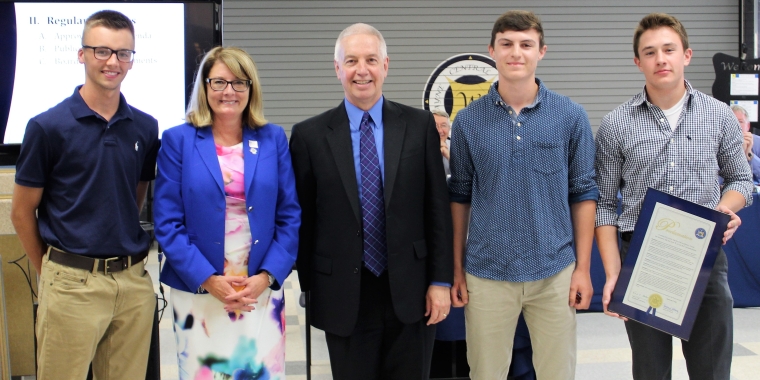 Senator Pam Helming and Assemblyman Bob Oaks stand with Tommy Bolt, Josh Armstrong, and Jack Lestrange, players for the Wayne Central varsity baseball team that won this year’s Section V Championship, the first section championship for the team in more than 60 years.