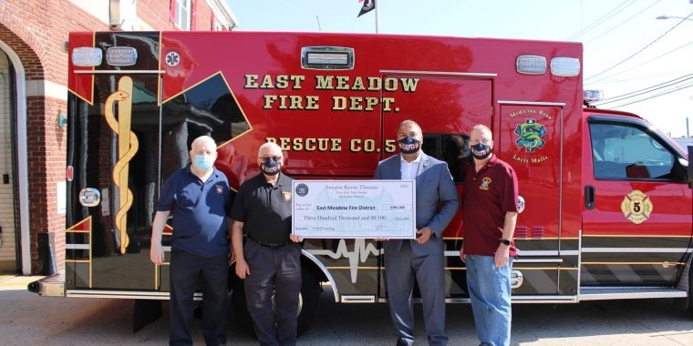 Left to right: Raymond L’Hommedieu, District Treasurer, East Meadow Fire District; Fire Commissioner Carey A. Welt; NY State Senator Kevin Thomas; and Fire Commissioner John J. Priest.