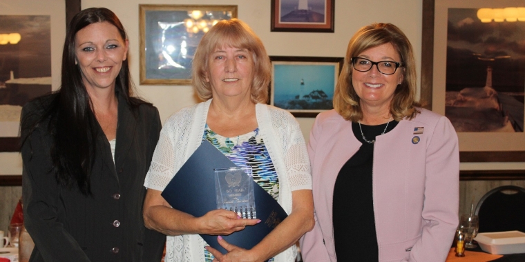 From left to right: Fairville Volunteer Fire Department Ladies Auxiliary President Michelle Iddings, 50-year Ladies Auxiliary member Sandi Jordan, and Senator Pam Helming.