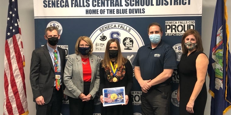 Pictured left to right: Seneca Falls Central School District Superintendent Jeramy Clingerman, Senator Helming, Liberty Medal recipient Laura Rundell, Seneca Falls Middle School Principal Kevin Rhinehart, Seneca Falls Board of Education President Cara Lajewski