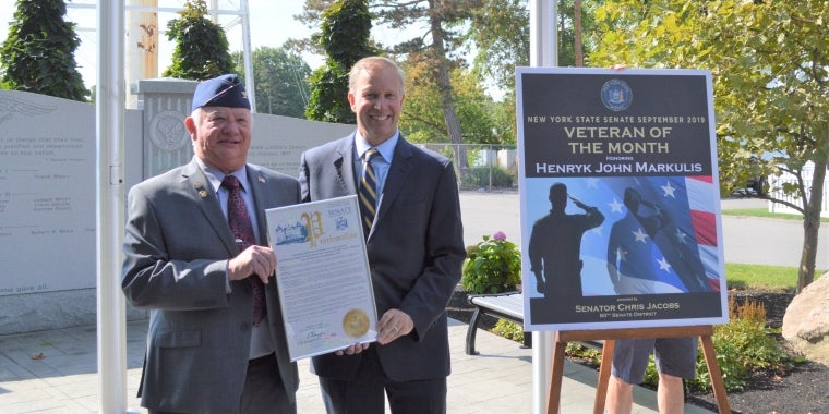 Retired United States Air Force Colonel H. John Markulis being recognized by Senator Jacobs as the September 2019 Veteran of the Month.