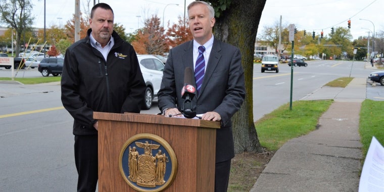 Town of Tonawanda Highway Superintendent Tom Jones and State Senator Chris Jacobs are pictured announcing $300,000 in state funds that Jacobs secured for much needed sidewalk replacements in the Town of Tonawanda.