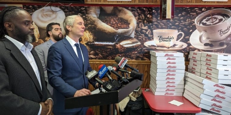 From left: Niagara Falls City Council Member Donta L. Myles, Assemblymember Jon Rivera, and Senator Sean Ryan address the media at Frankie's Donuts in Niagara Falls, Jan. 27, 2023
