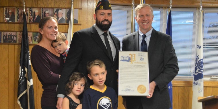L-R - Kara Siulc with son Hendrick, Nadia and Maxim Siulc, US Army Veteran and Post 1419 Commander Stephen Siulc and State Senator Chris Jacobs.