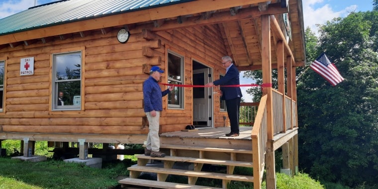Senator Tedisco joins William Osborne to officially cut the ribbon for the Southern Adirondack Mountain Rescue Training Center