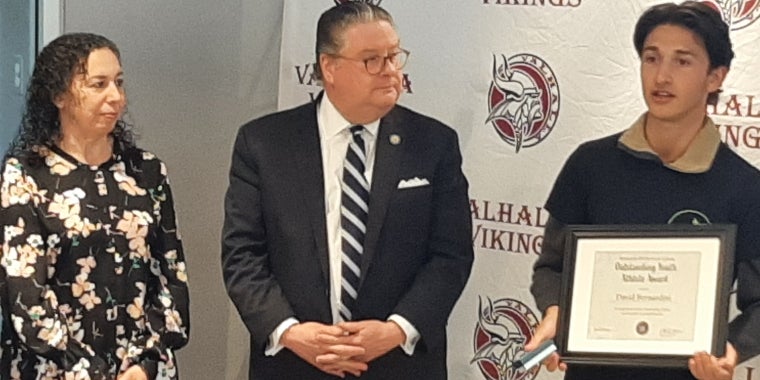 Sen. Pete Harckham with Stephanie Marquesano and David Bernardini during Outstanding Athlete Award presentation at Valhalla High School