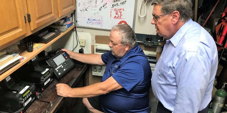 Photo attached, suggested caption: West Oneonta Volunteer Fire Department Chief Water Schmitt (seated) demonstrates the departments new omni-directional alert & voice mass notification system.for Senator Seward. Senator Seward secured a $30,000 state grant to help fund the new alert system.