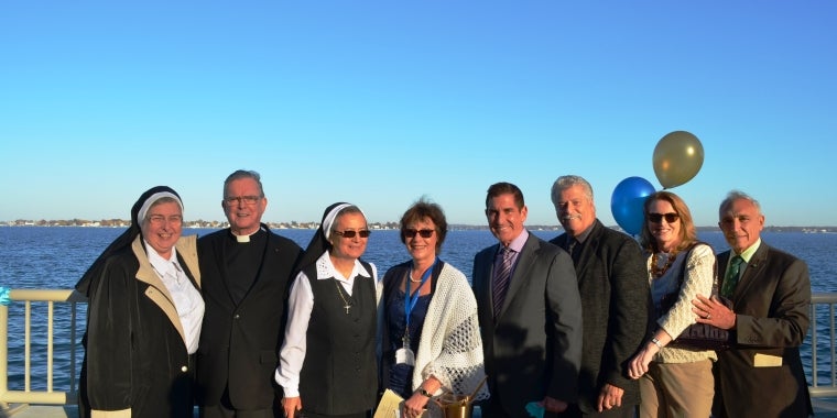 PHOTO (from left to right): Sister Claudette Jaszczynski, Monsignor Thomas E. Gilleece, Sister Seline Mary Flores, Susan Steinberg, Senator Jeff Klein, Tommy Messina, Joseph Sciame, and Dr. Anne Casey.