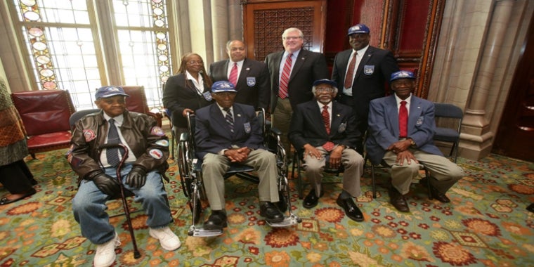 The veterans in the front row are, from left to right: William J. Johnson of Glen Cove, Audley Coulthurst of Harlem, Wilford R. DeFour of Harlem, and Herbert C. Thorpe of Brooklyn.  Michael Joseph of Corning is standing to Senator O’Mara’s immediate left in the photo.