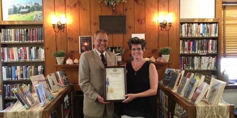 Senator Bonacic presents a ceremonial pen certificate to Lisa Palmer, Manager of the Wallkill Public Library.